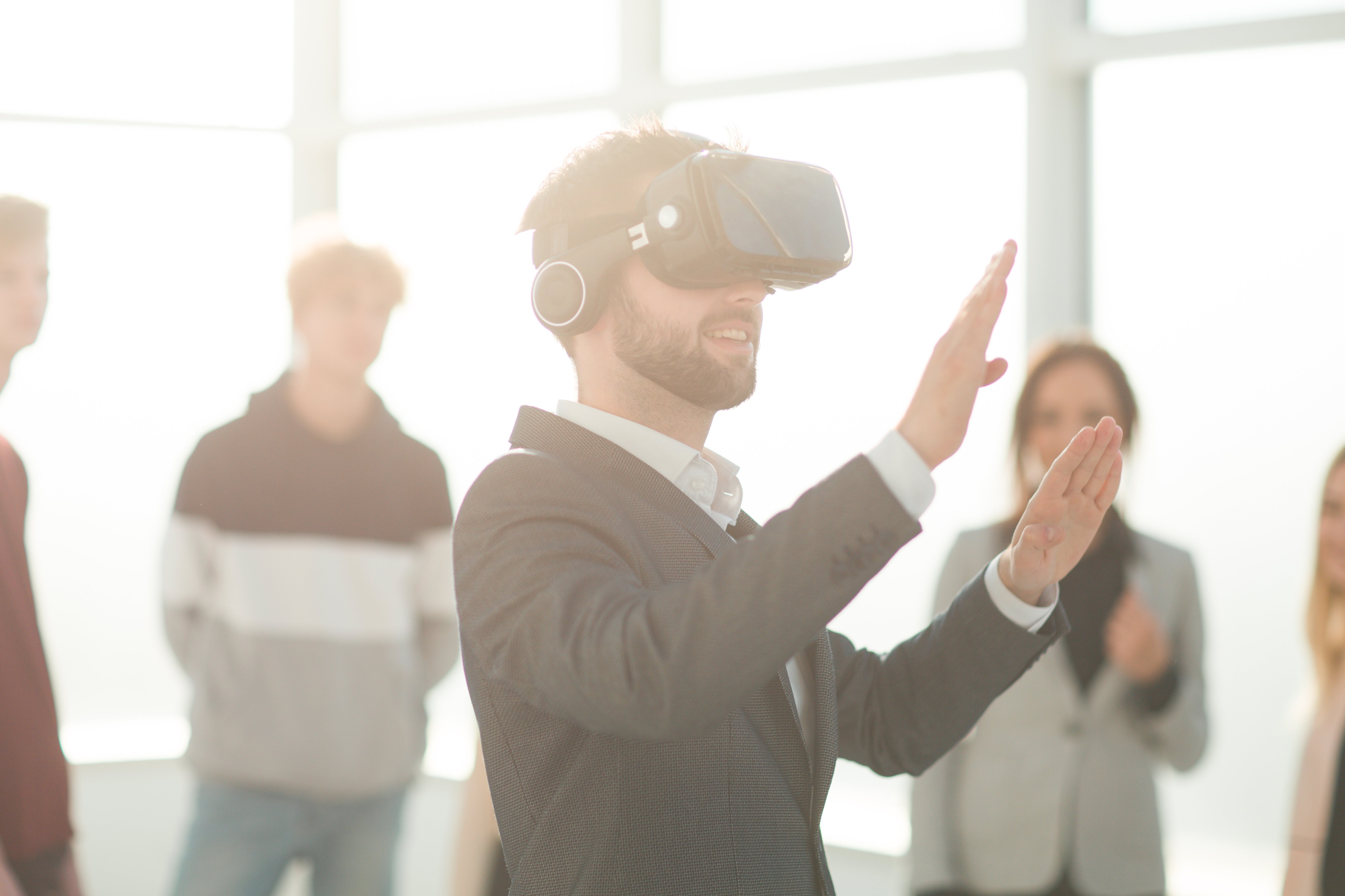 Man wearing VR headset in corporate team building event