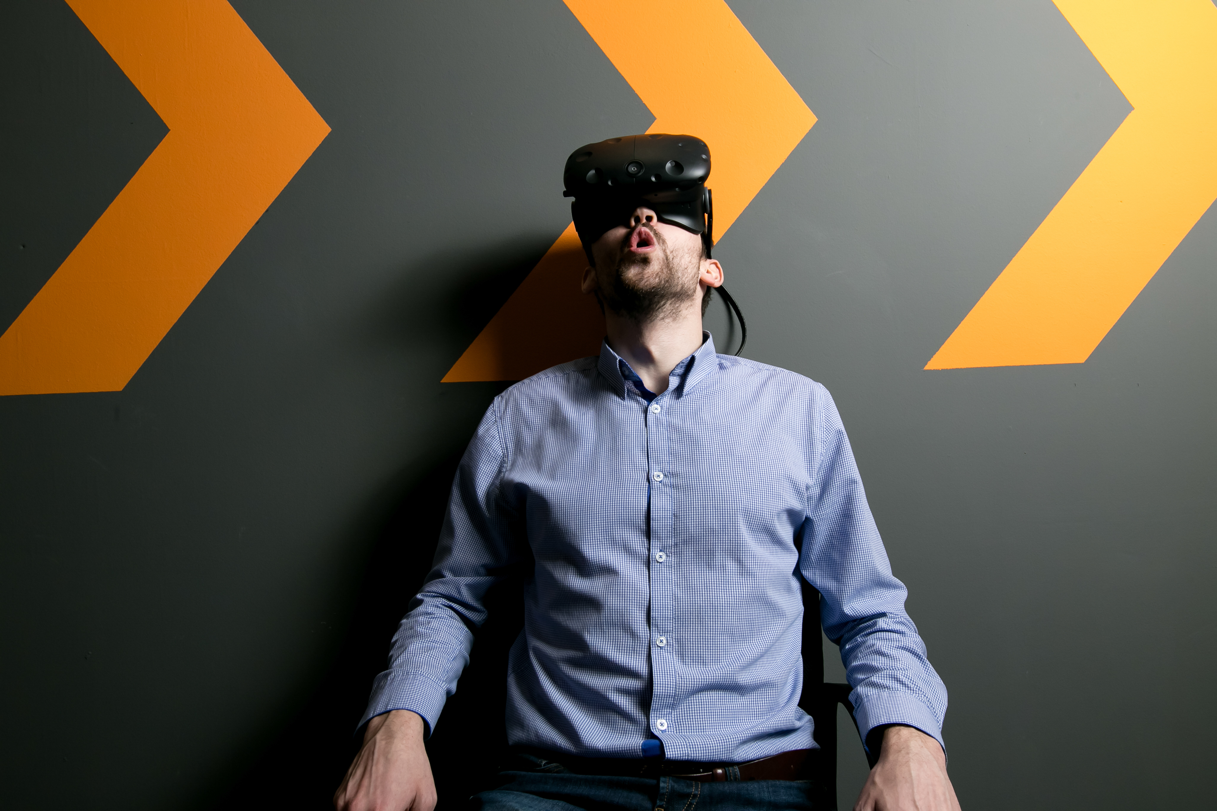 Man in VR headset to demonstrate the Commercial VR Business Model