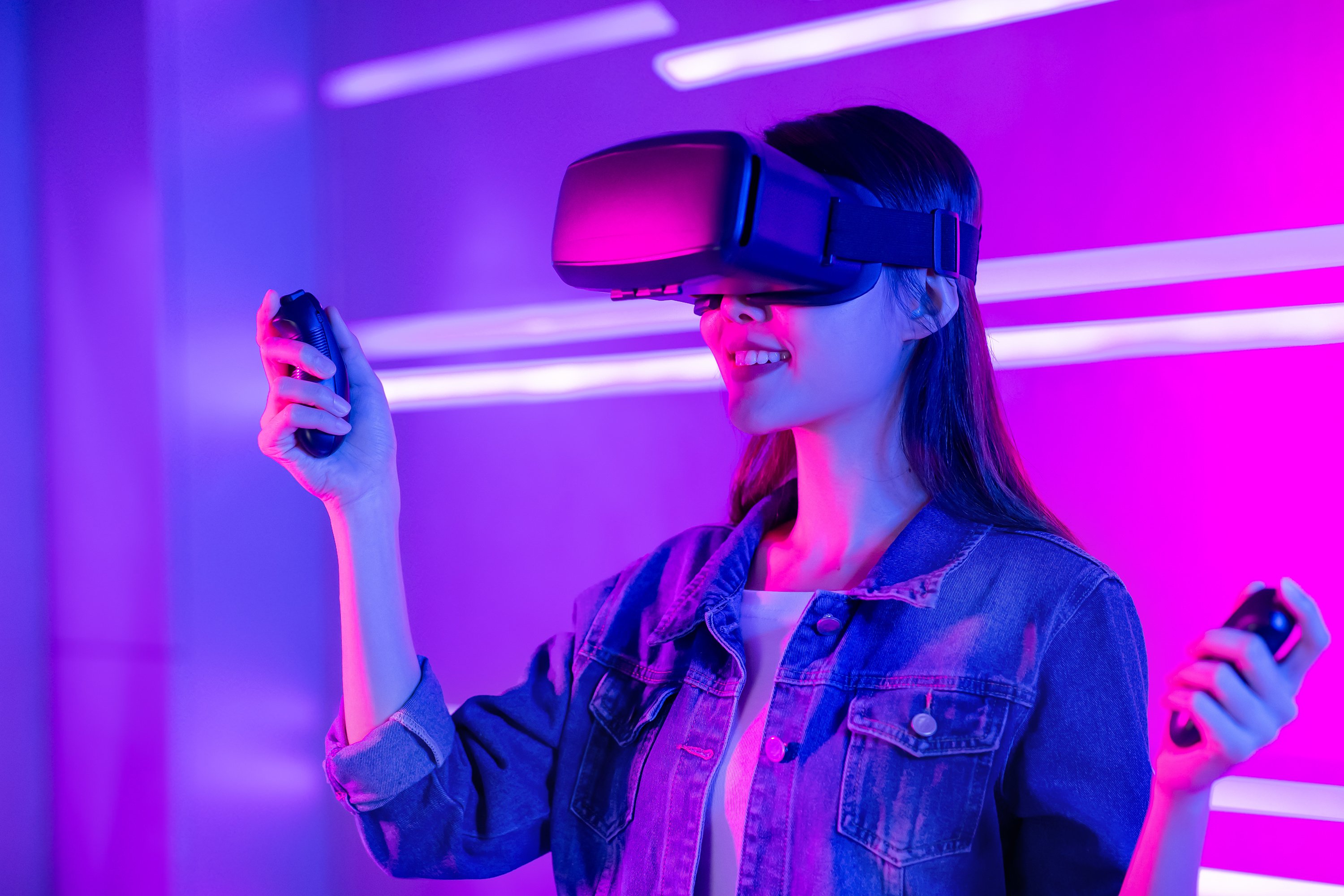 Woman in VR headset with bright lights