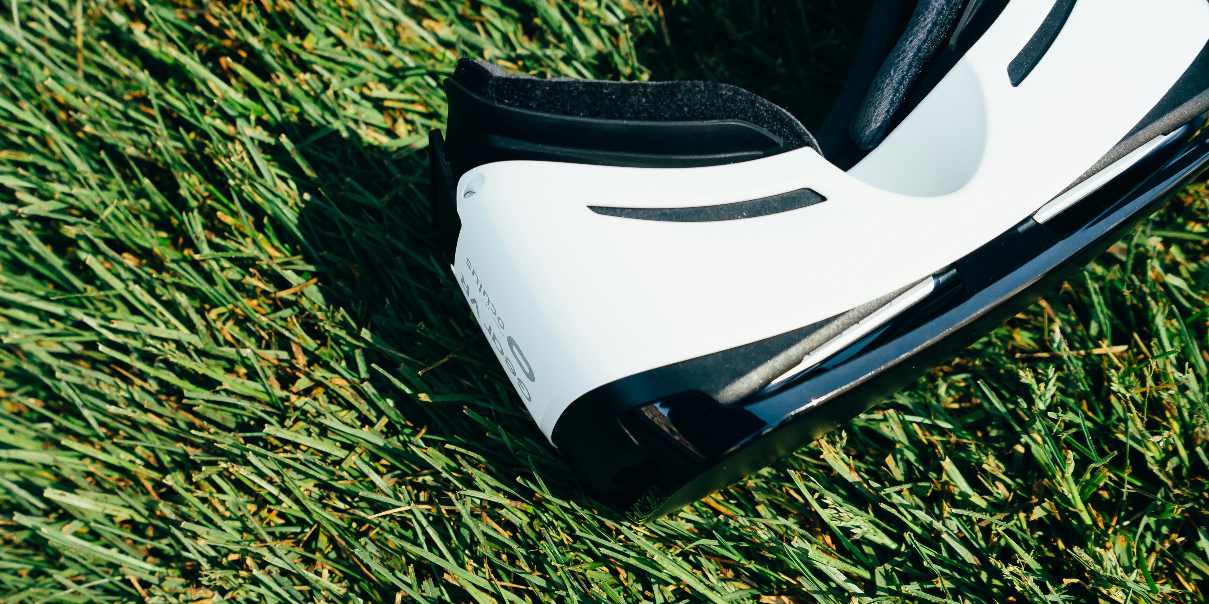an image of VR headset against grass
